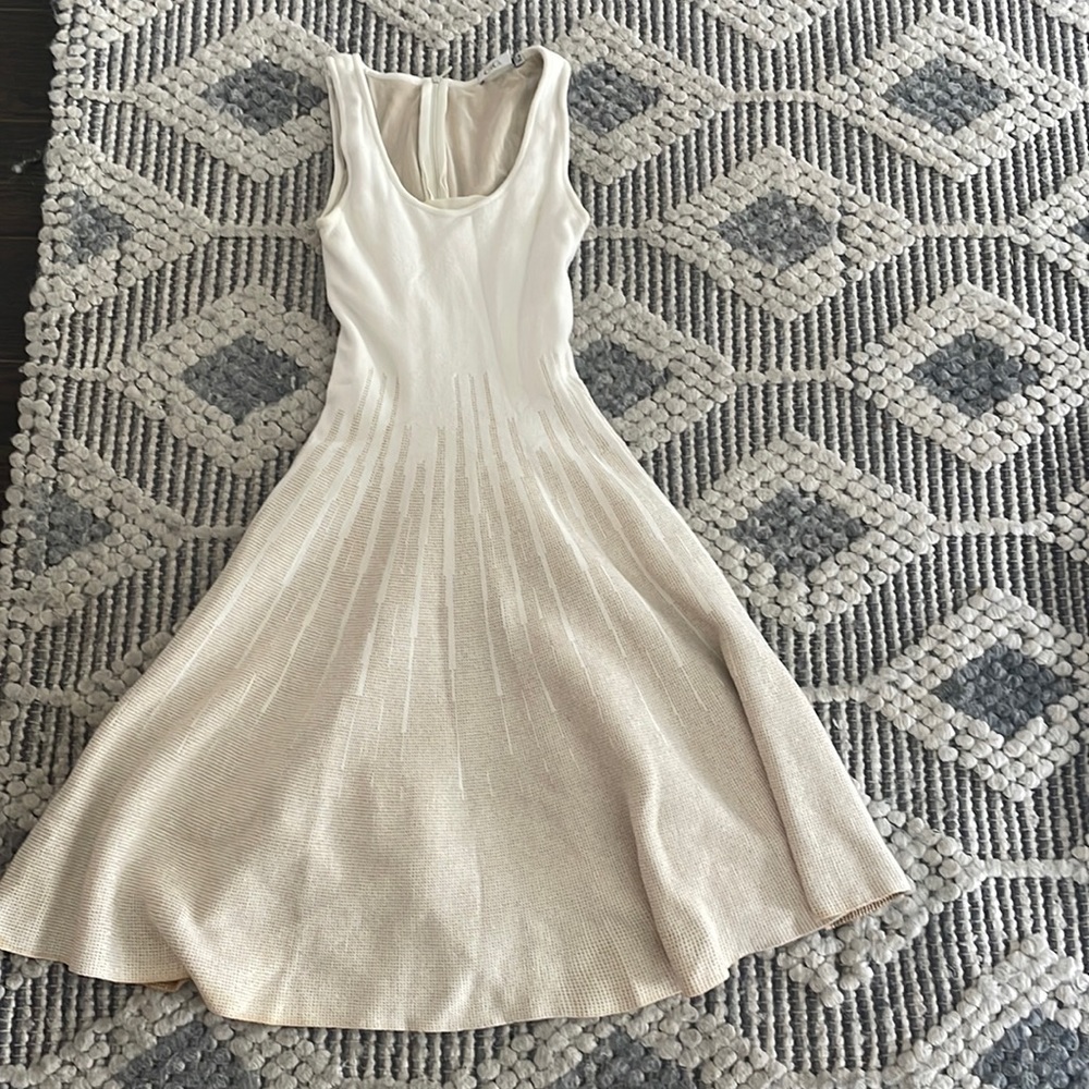 Gorgeous white Gigi dress with gold detailing